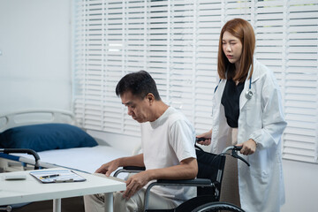 Obraz premium Elderly care concept. Portrait of nurse and her senior client on wheelchair.