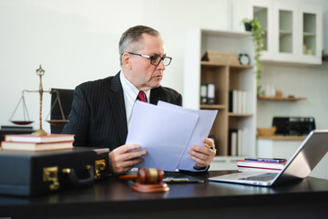 Professional male lawyers consulting on legal cases in a modern office. Perfect for law, business, justice, legal advice, corporate attorneys