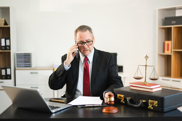 Male judge in courtroom, lawyer working in office. Perfect for business, legal advice, corporate law