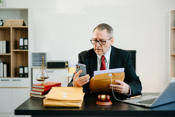 Professional male lawyers consulting on legal cases in a modern office. Perfect for law, business, justice, legal advice
