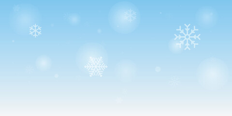 Winter background, snowflakes on a beautiful background, Christmas background for cards, snowfall. Snowy nature landscape, winter with gradient blue