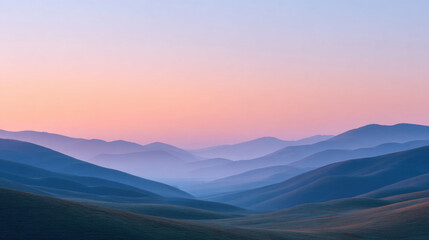 Rolling hills with morning mist and soft sunrise colors create tranquil and peaceful landscape scene filled with calm and serenity