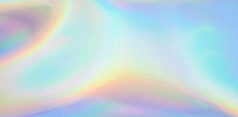 Obraz premium Holographic rainbow foil iridescent texture abstract hologram background