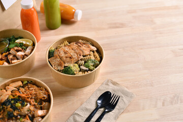 Having a lunch break at the office with delicious Healthy food delivery in take away boxes, Healthy eating concept.