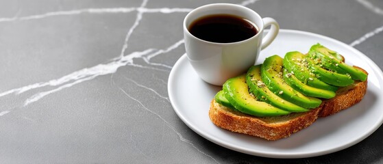 commercial food beverage plating concept. Avocado toast with coffee on a marble table, perfect for a healthy breakfast.