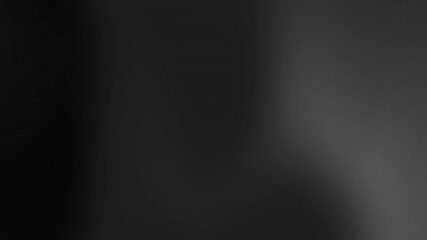 A blurred dark grey with smooth fluid creating a gradient. 4k motion background	 - Powered by Adobe