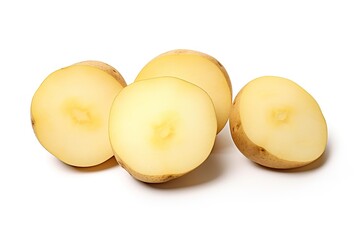 Freshly sliced potatoes showing their internal texture on a clean white background