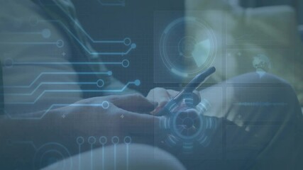 Man tapping phone animating UI overlays cycling circuit lines, ring and globe for technology demo - Powered by Adobe