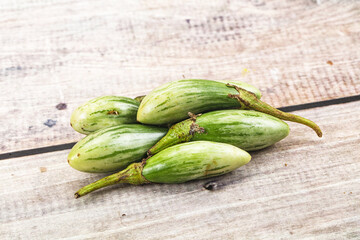Small organic young green eggplant