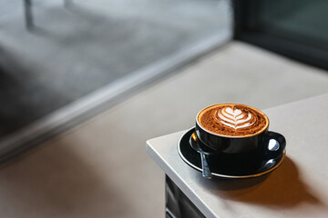 Coffee Art In Black Mug