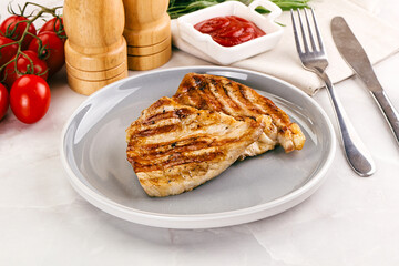 Grilled pork steak with sauce