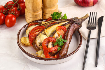 Baked tomato with mozzarella and tomato