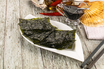 Green nori seaweed chips with soya sauce
