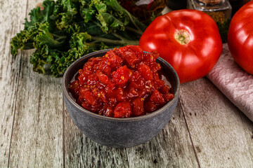 Diced ripe tomato with sauce