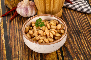 Baked white canned beans in the bowl