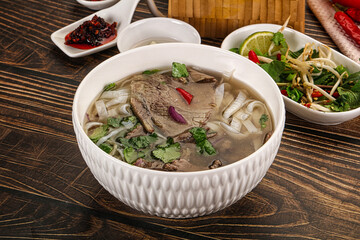 Vietnamese Pho Bo soup with beef and noodles