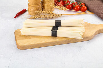 Raw dry white wheat noodles