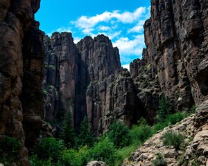 Blocky Cliffs Landscape Under Clear Blue Sky – Nature Rock Formation Illustration

