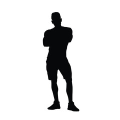Silhouette of a Man Standing with Arms Crossed