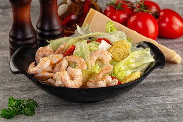 Tasty caesar salad with prawn