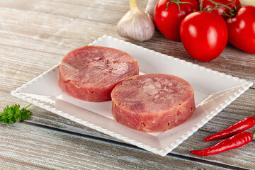 Raw round tuna fish fillet