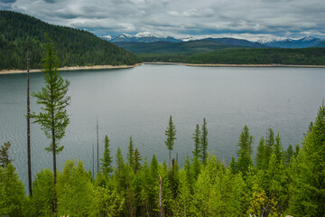 Breathtaking Hungry Horse Reservoir in the Flathead valley of beautiful northwestern Montana. Surrounded by towering mountains and is 34 miles long with 170 miles of shoreline.