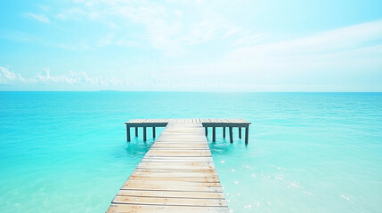 Obraz premium Wooden dock stretching into turquoise waters, serene beach backdrop. Tranquil escape into nature's beauty.