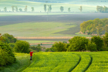 Man enjoying gorgeous rural landscape in South Moravia region, Czech Republic