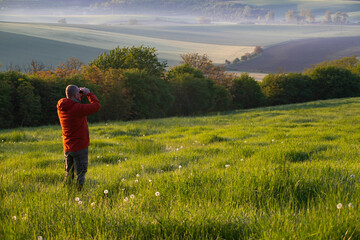 Man enjoying gorgeous rural landscape in South Moravia region, Czech Republic
