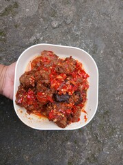 Jerado balado or Dendeng balado is a traditional cuisine from west sumatera, indonesia. it is made...
