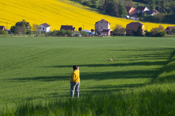 Happy woman enjoying gorgeous rural landscape in South Moravia region, Czech Republic