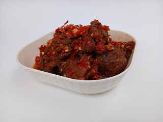 Jerado balado or Dendeng balado is a traditional cuisine from west sumatera, indonesia. it is made from slice of beef with spicy sauce called sambal. 