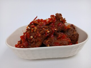 Jerado balado or Dendeng balado is a traditional cuisine from west sumatera, indonesia. it is made from slice of beef with spicy sauce called sambal. 