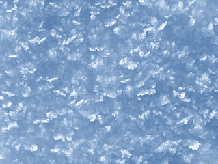 Background of winter snow texture. Small ice crystals on surface of snow natural background