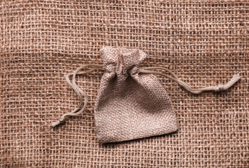 Mini bag on burlap. Top view