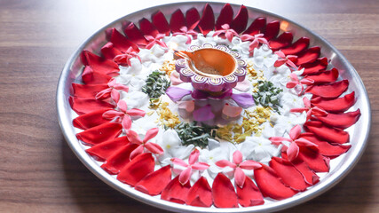 Aarti thali, Pooja thali decoration with diya and fresh flowers