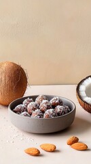 Delicious plant-based snack with almonds and coconut flakes in a rustic kitchen setting