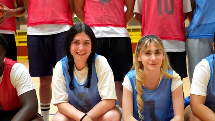 Young basketball players posing for team photo - Powered by Adobe