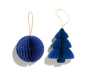 Paper Christmas tree and New year ball blue color isolated white background, sunlight shadow. Festive hanging Christmas ornaments paper bauble, winter holiday xmas decor, top view, minimal design