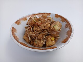 tahu telur or tahu gimbal or tahu tek or egg tofu. is a typical food of the city of Semarang. This food consists of fried tofu, chopped raw cabbage, rice cake, bean sprouts, eggs