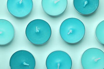 Blue Aroma tea candles on a blue pastel background. Minimalistic layout, Top view