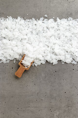 Top view of magnesium flakes scattered from scoop. Natural sea salt as wellness or spa products for bath or relaxation, self-care or sustainable living, Wellness and Body Function Enhancement