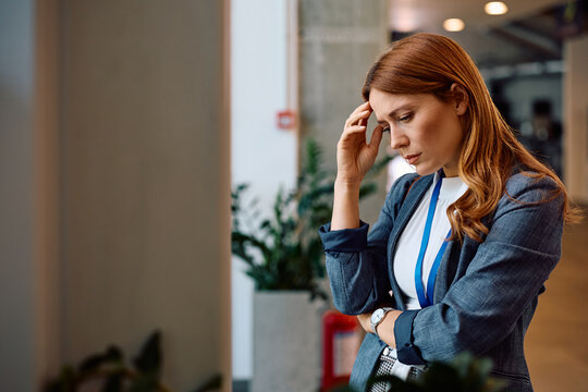 Worried businesswoman thinking of her problems at work. - Powered by Adobe
