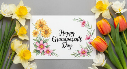 Arrangement of Flowers with Happy Grandparents Day Text on Grey Background