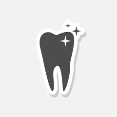 Tooth icon with sparkle sticker isolated on gray background