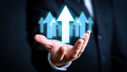 A hand gently cradles rising blue arrows