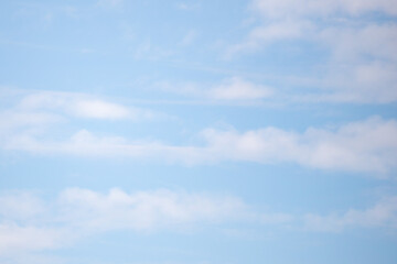 The sky is blue and clear with a few clouds scattered throughout
