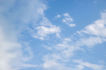 The sky is blue and clear with a few clouds scattered throughout