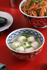 Singapore Fish ball Soup, Clear Soup Broth with White Chewy Fishball and Chopped Spring Onion
