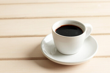 A Cup of Black Coffee on Wooden Table